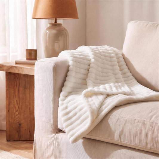 white throw blanket for couch in the Hollow Pine house