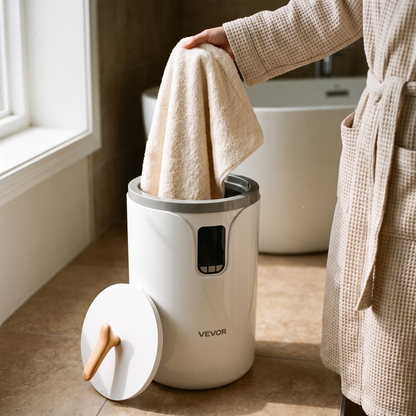Lifting a warm towel out of the bucket style towel warmer after a bath